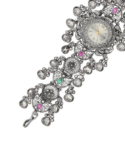 Bracelet watch with filigree patterns and stone accents