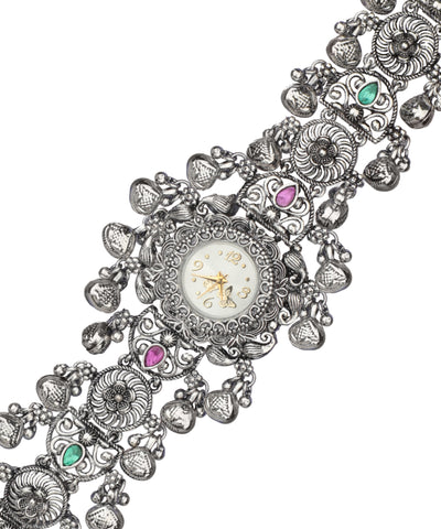 Ornate heritage bracelet watch with a wide band silhouette