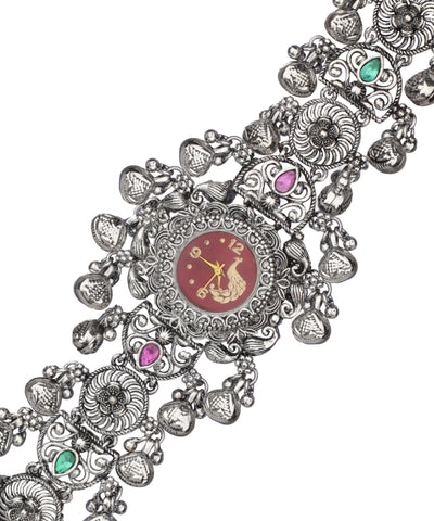 Heritage bracelet watch with a wide ornate cuff design