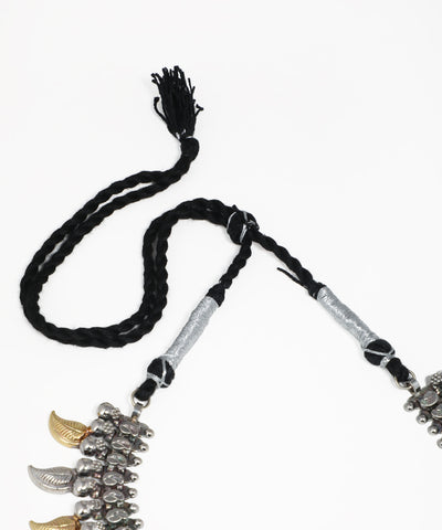 Handcrafted dual-tone oxidised jewelry set with dangling leaf charms