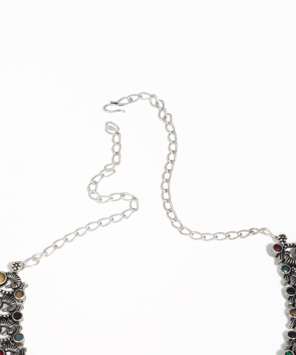 Traditional oxidised peacock necklace set featuring colorful stone accents and pearl detailing