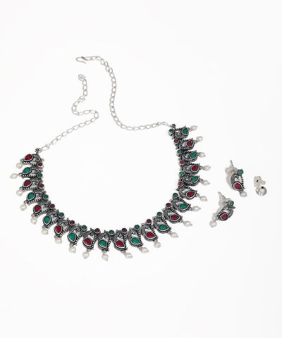 Women's ethnic oxidised necklace set with peacock motifs and pearl embellishments