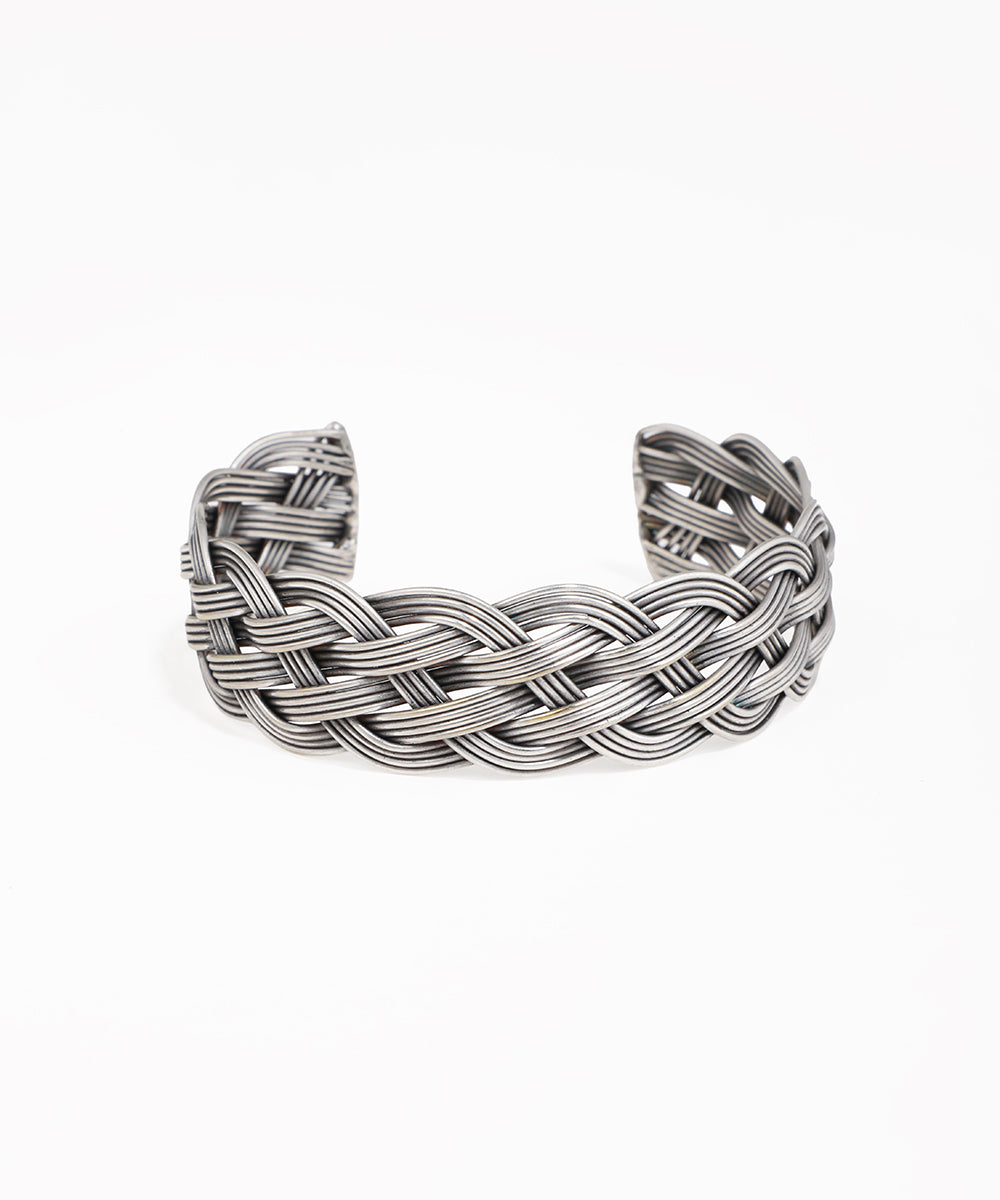 Oxidised silver braided kada cuff bracelet with intricate woven metal design