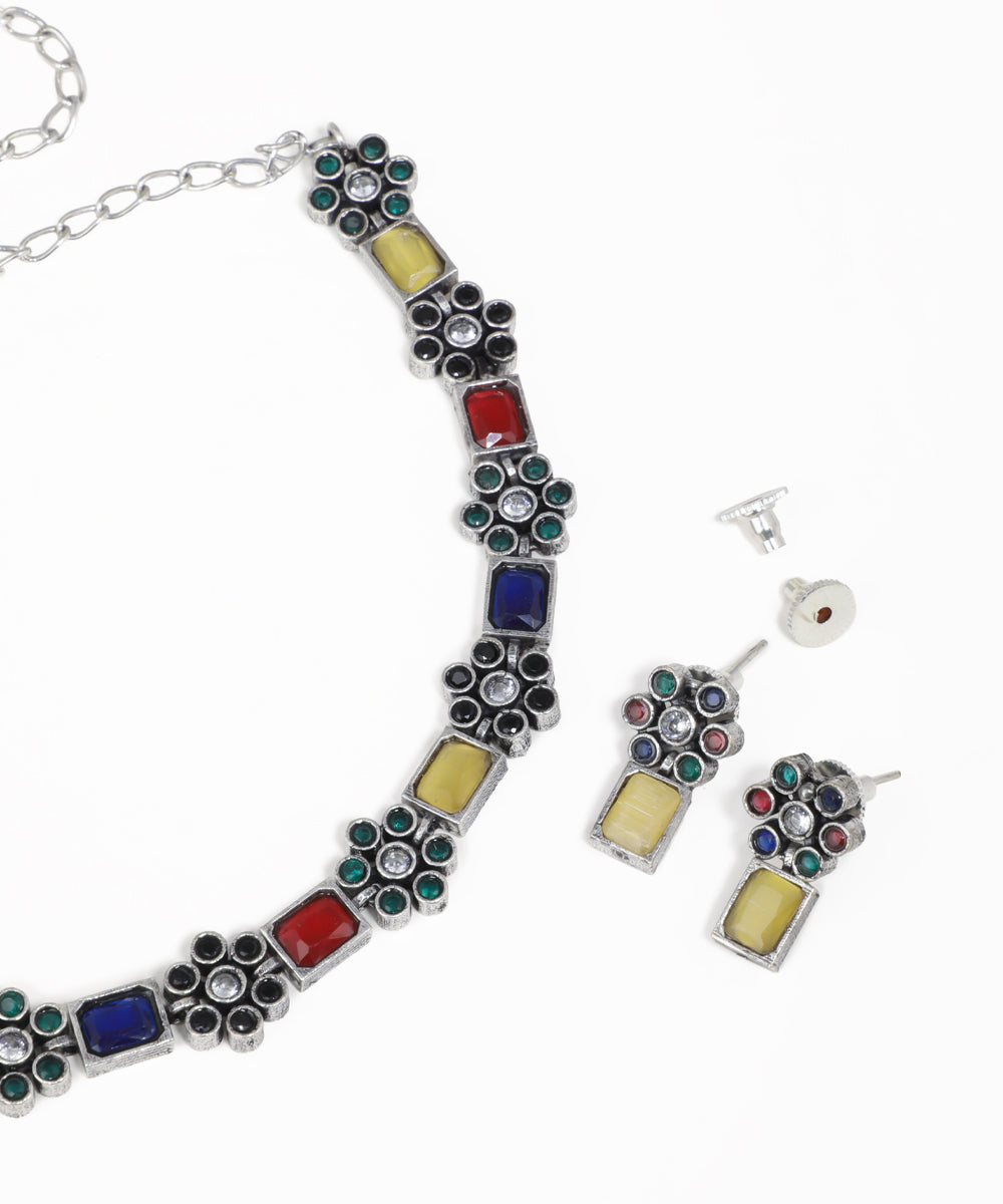 Intricate floral oxidised necklace set with multicolor stone accents and matching earrings