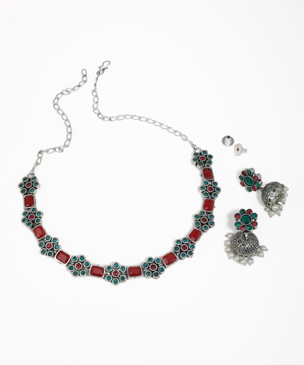 Traditional oxidised silver necklace and earrings set with red, blue and yellow stones