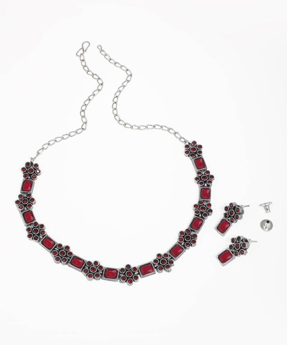 Traditional Indian oxidised jewelry set with floral patterns and vibrant stones