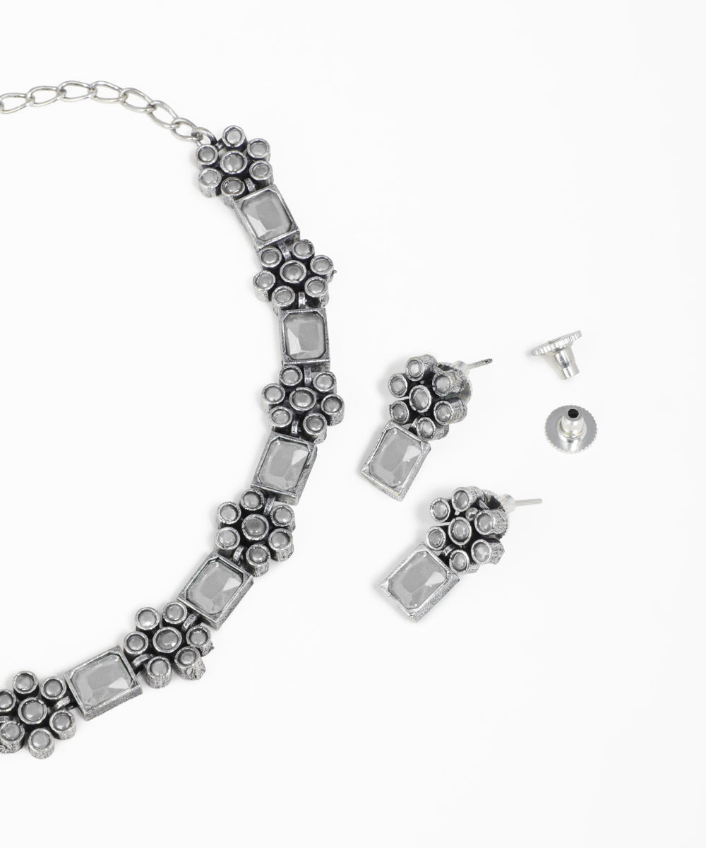 Intricate floral oxidised necklace set with multicolor stone accents and matching earrings