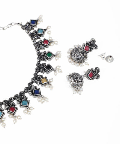 Oxidised silver necklace and earrings set with colorful gemstone accents and pearl danglers