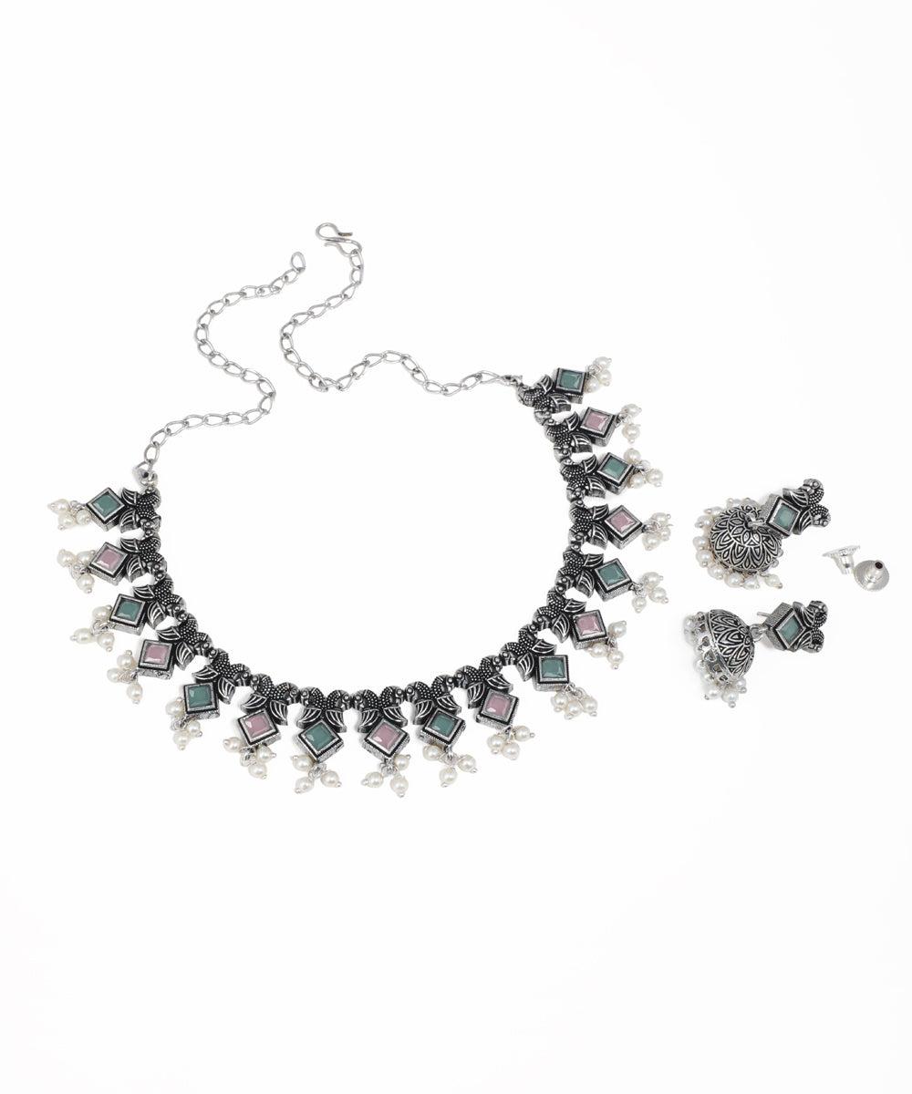 Festival-style oxidised necklace set with multicolor stones, pearl drops and ethnic detailing