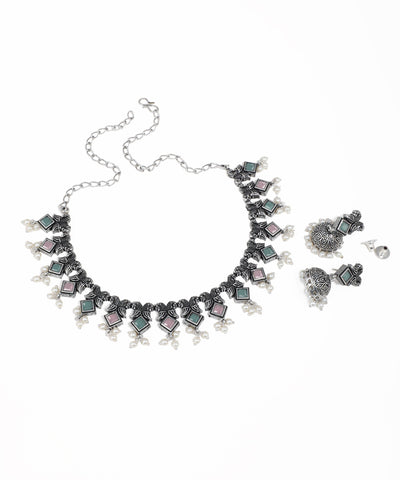 Festival-style oxidised necklace set with multicolor stones, pearl drops and ethnic detailing