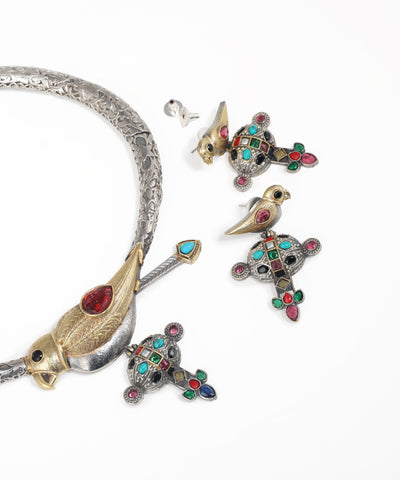 Oxidised bird motif necklace set with colorful gemstone accents and matching statement earrings