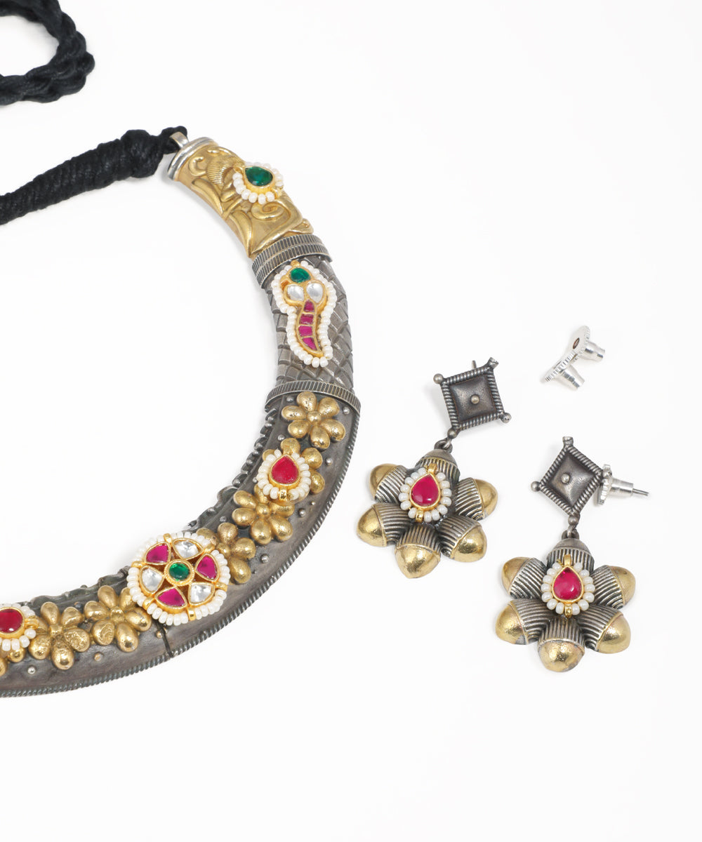 Oxidised floral statement necklace set with pink and green stone accents and matching earrings