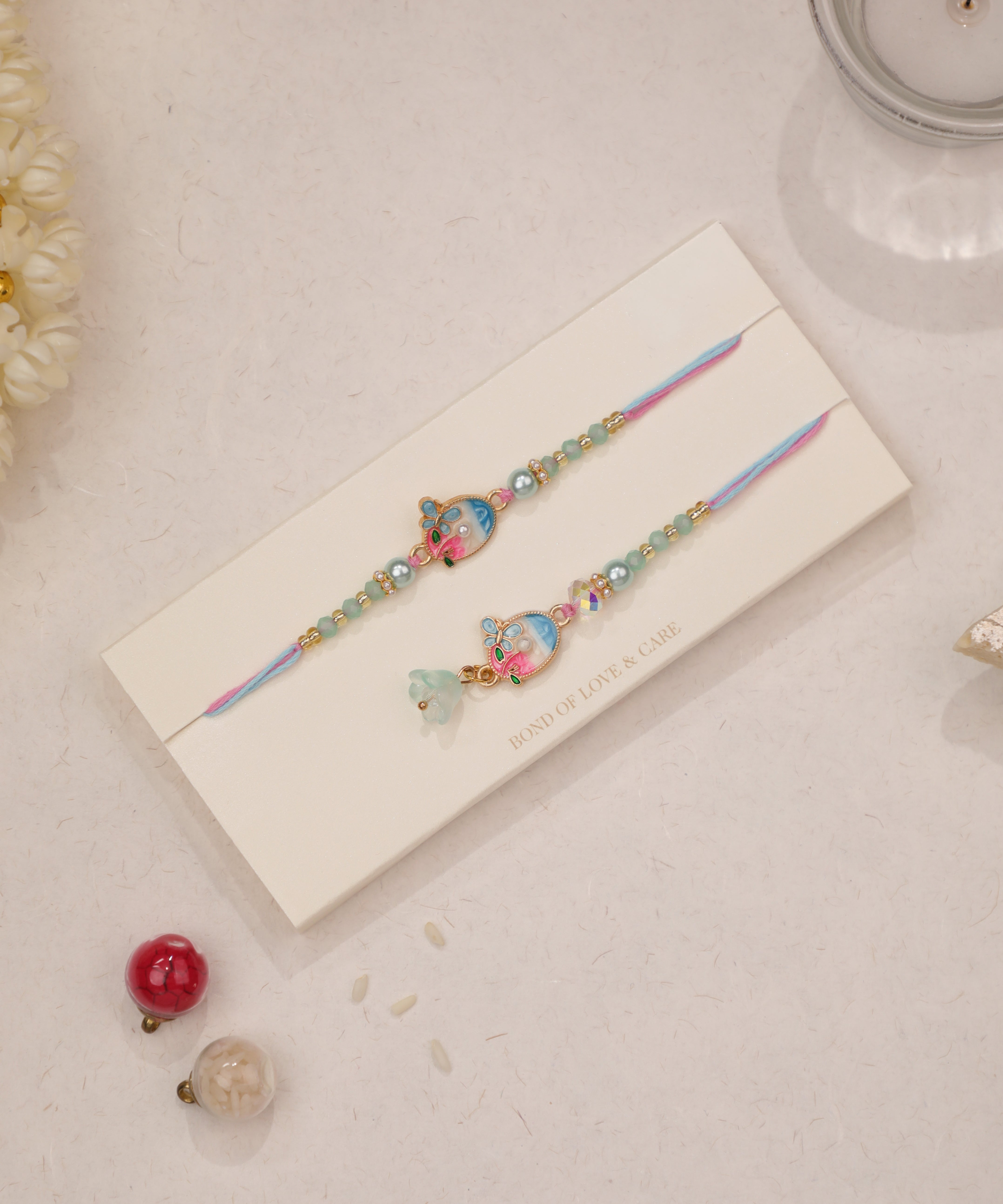 Pastel Floral Bhaiya Bhabhi Rakhi Duo Set | Stylika