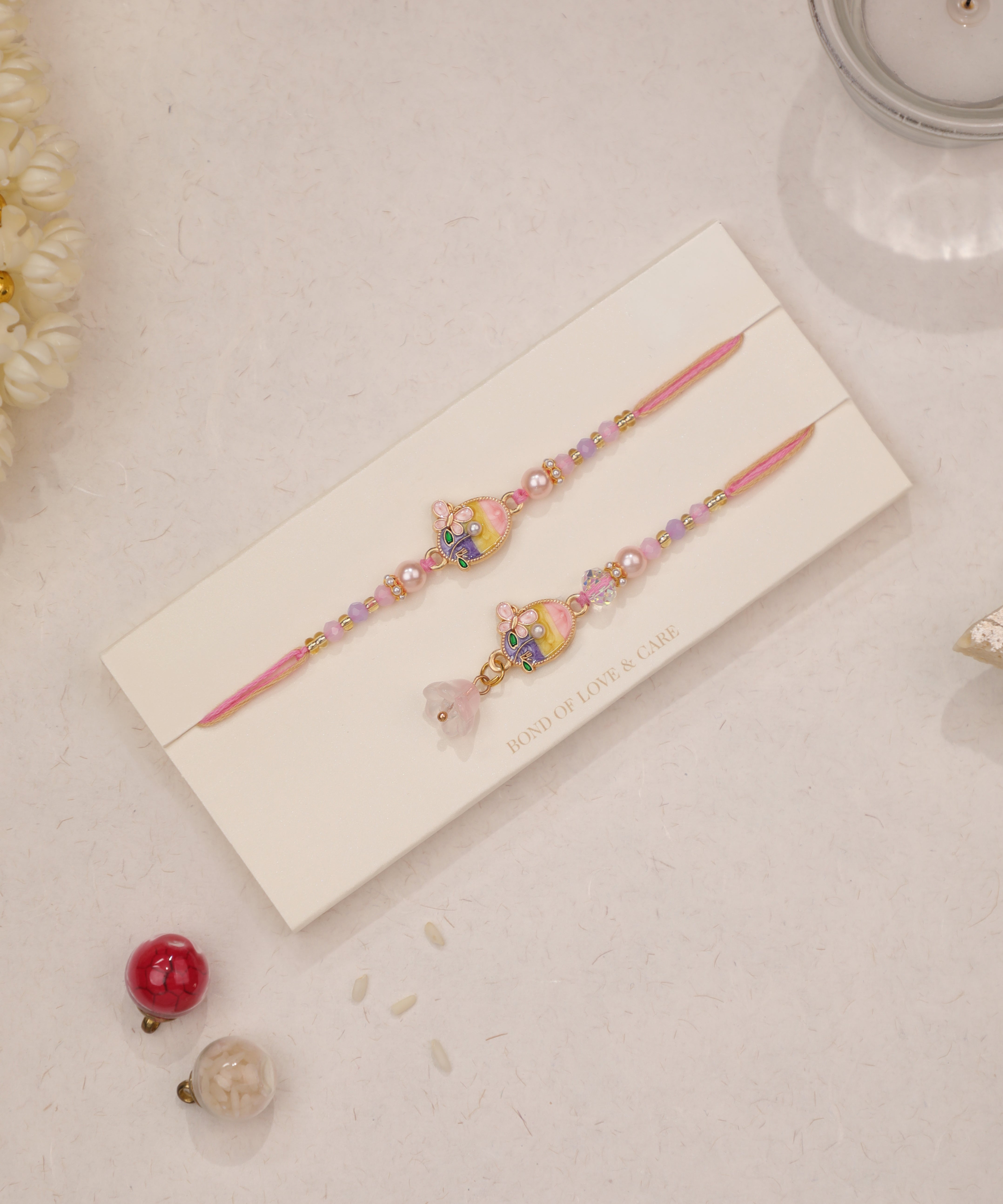 Pastel Floral Bhaiya Bhabhi Rakhi Duo Set | Stylika
