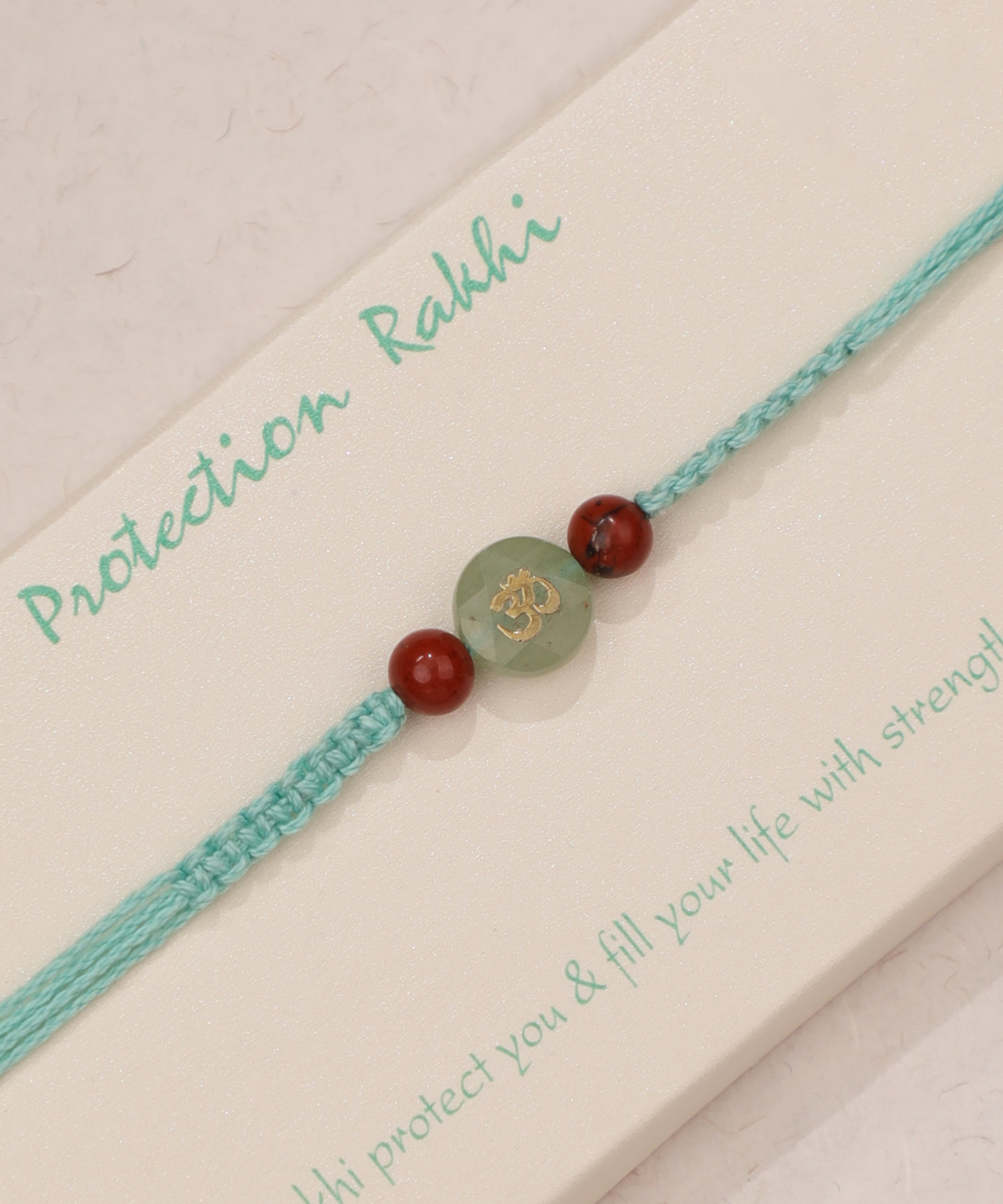 Auspicious Om Stone Bead Thread Rakhi Bracelet | Stylika