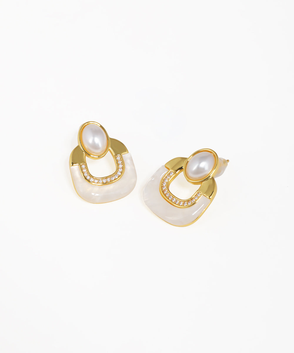 Geometric arch statement stud earrings inspired by Art Deco design