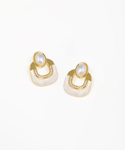 Art Deco geometric arch stud earrings with crystal accents and gold-tone finish