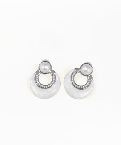 Gold arch drop earrings featuring iridescent disc accents
