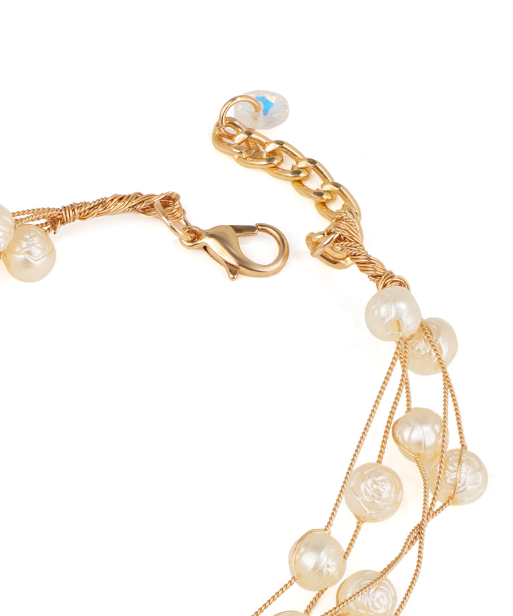 Multi-Strand Bracelet with Floral Embellishments | Stylika