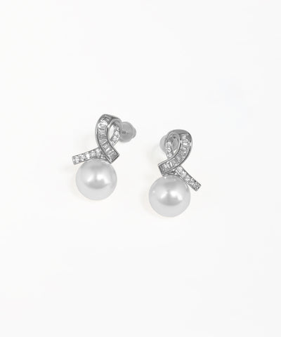 Modern knot drop earrings with sculptural silver-tone styling