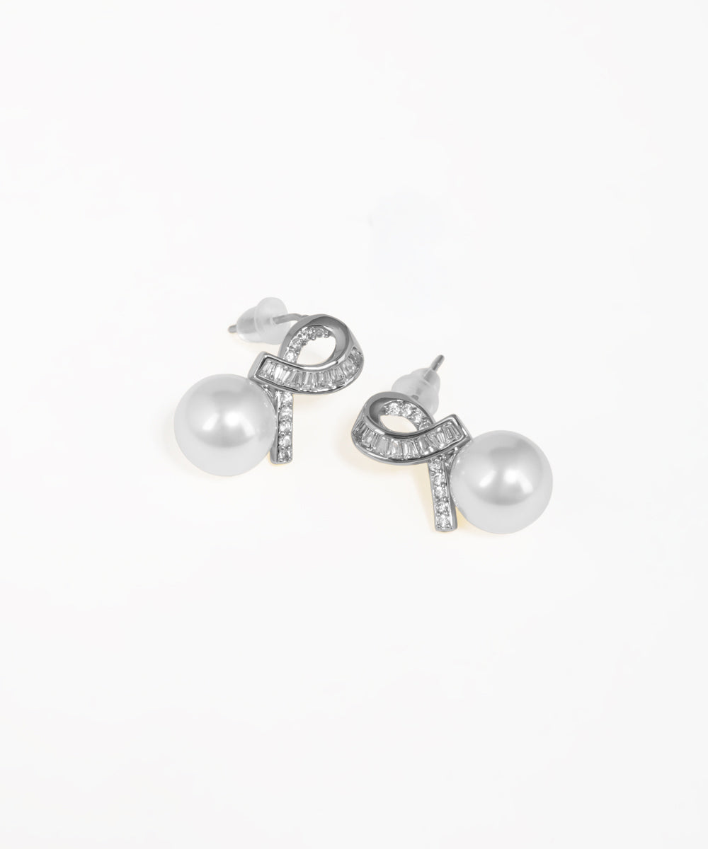 Gold-tone stud earrings with intertwined knot and drop design