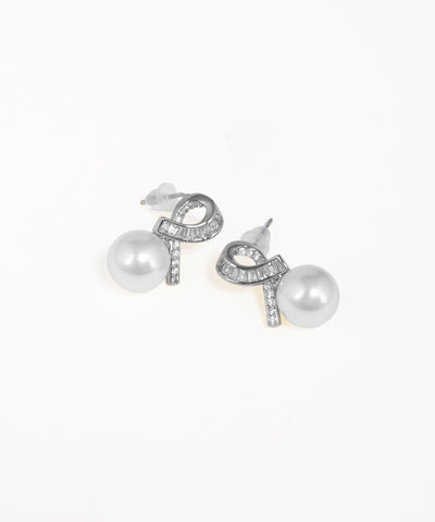 Gold-tone stud earrings with intertwined knot and drop design