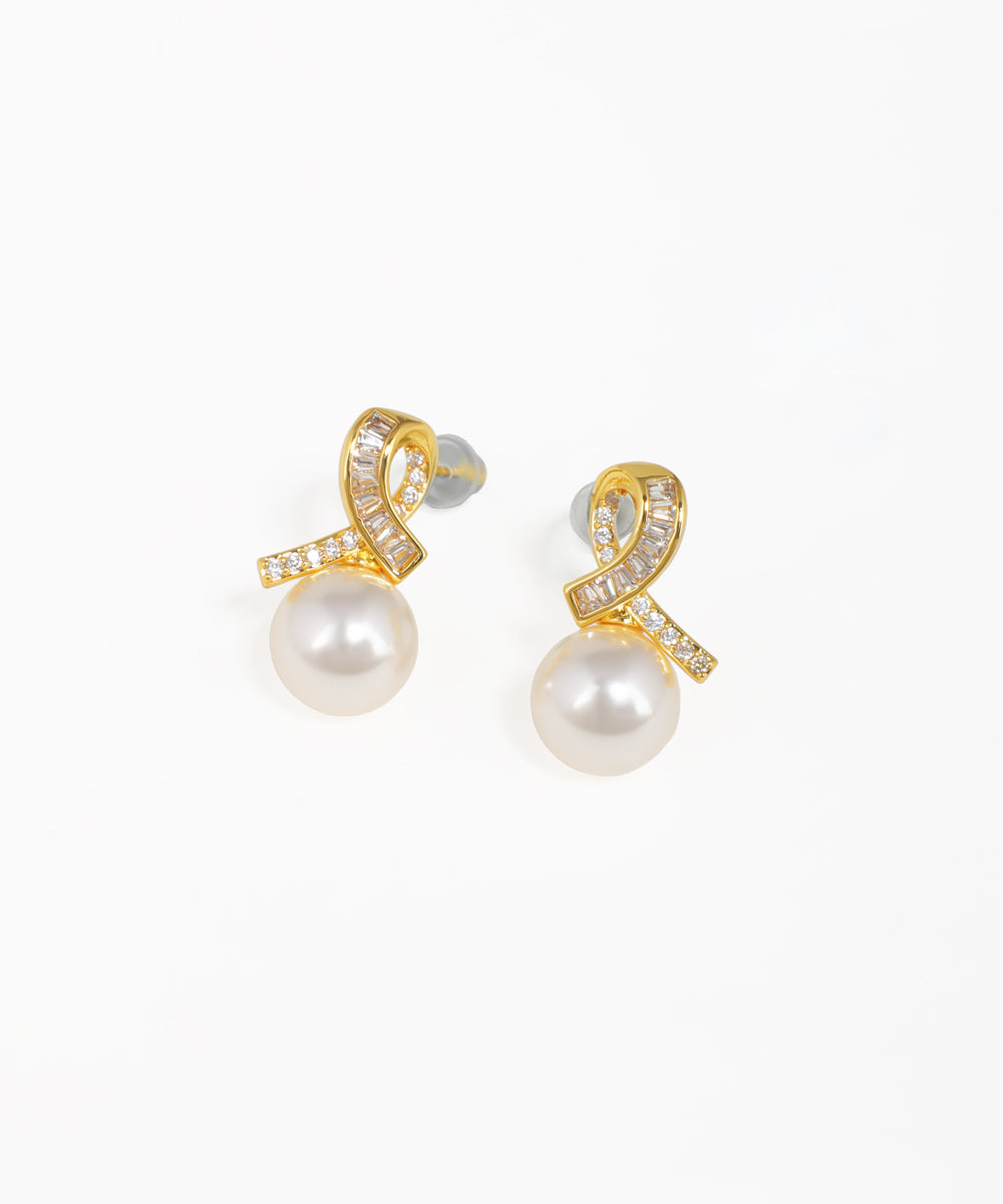 Chic knot drop stud earrings with gold-tone finish and polished design