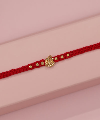 Handcrafted Ganesha Motif Beaded Red Thread Rakhi | Stylika