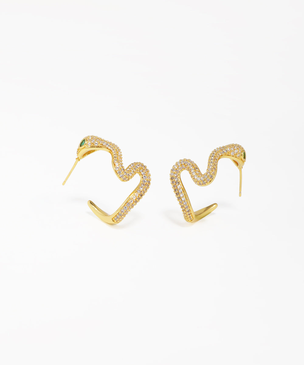 Wavy pavé snake stud earrings with sparkling crystal detailing