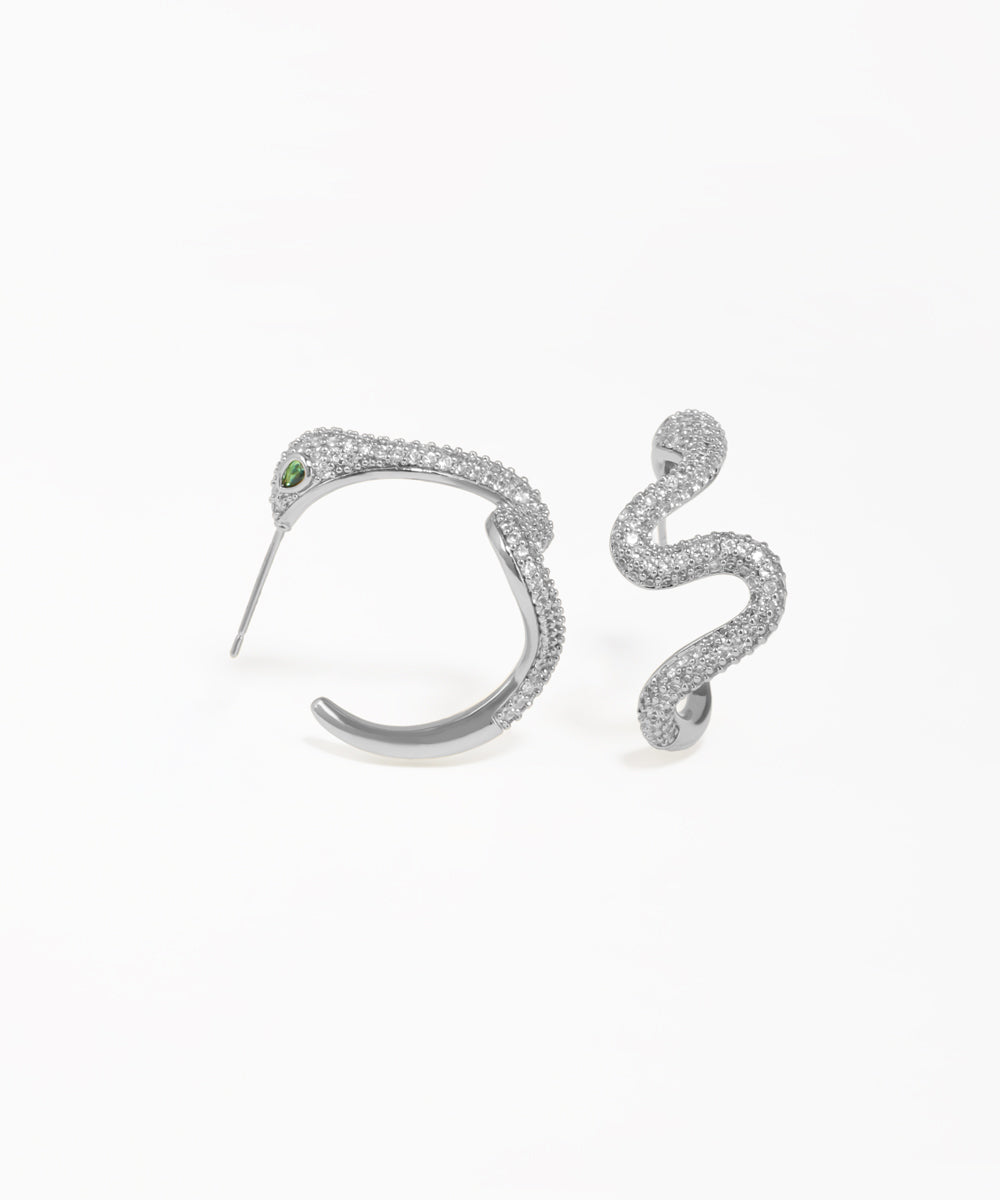 Sculptural wavy snake earrings with crystal pavé detailing