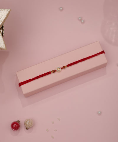 Sparkle Swastika Motif Red Thread Rakhi for Celebrations | Stylika