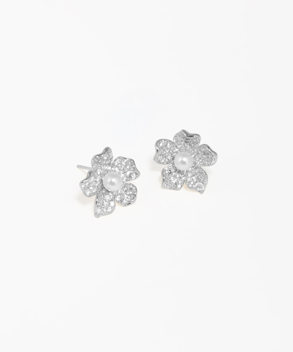 Pearl flower stud earrings with elegant silver-tone detailing