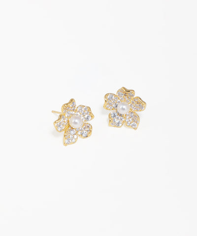 Flower motif stud earrings with pearl center and gold-tone finish