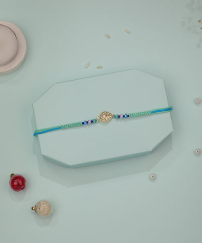 Delicate Leaf Charm Rakhi with Colorful Beads | Stylika