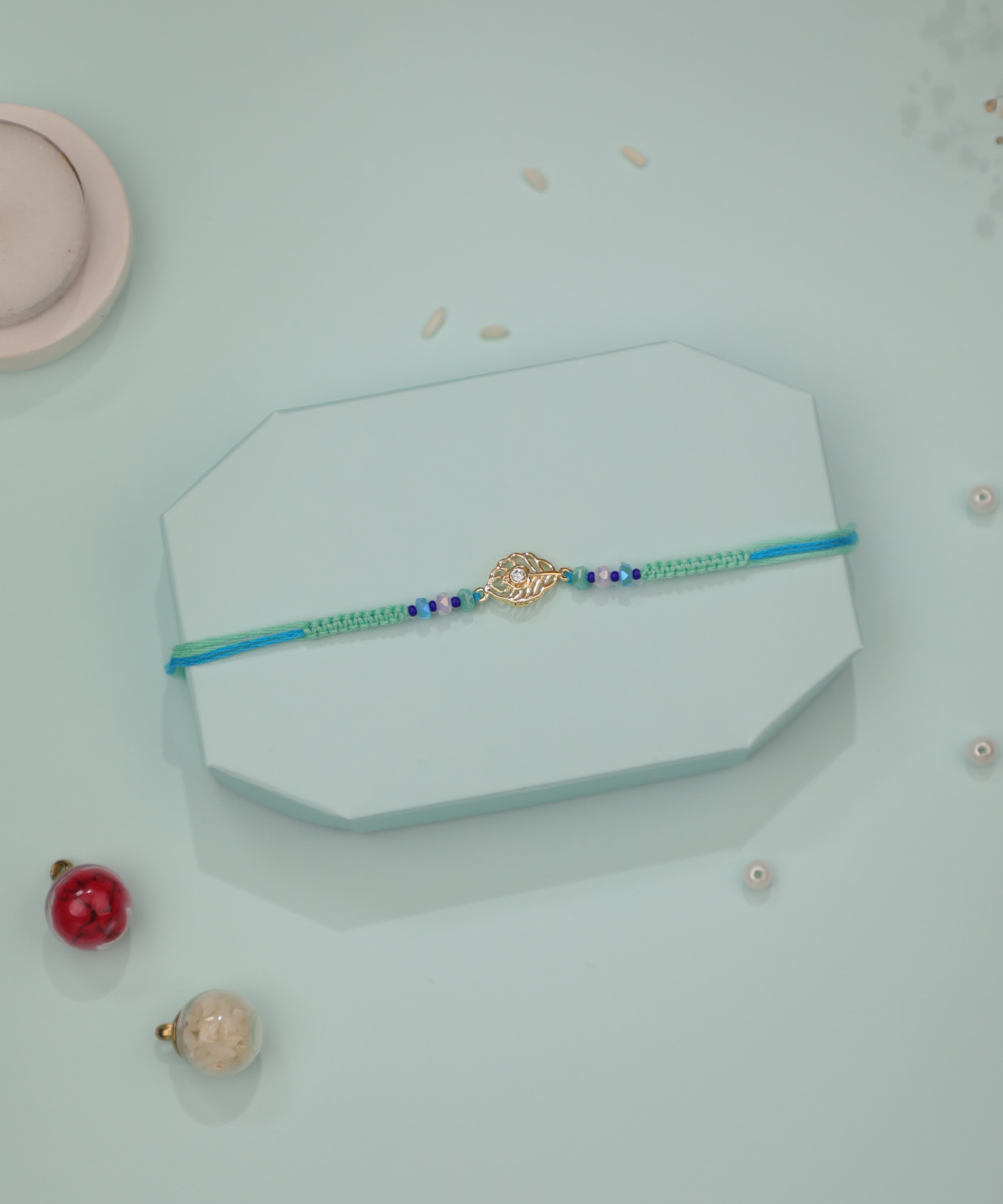 Delicate Leaf Charm Rakhi with Colorful Beads | Stylika