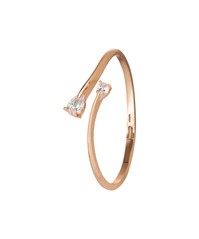 Kada bracelet featuring a teardrop cubic zirconia motif