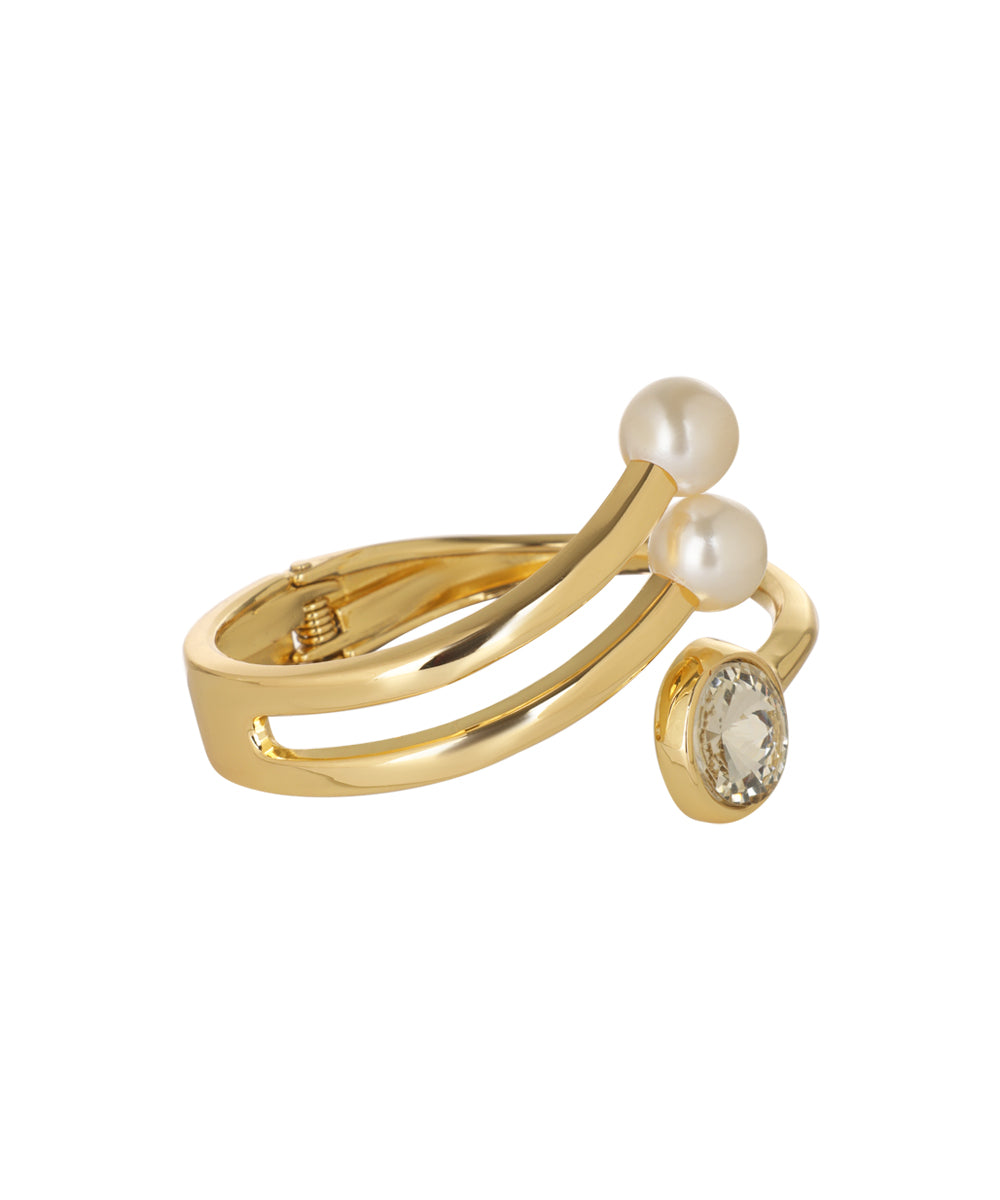 Kada bracelet featuring a glass crystal and faux pearls