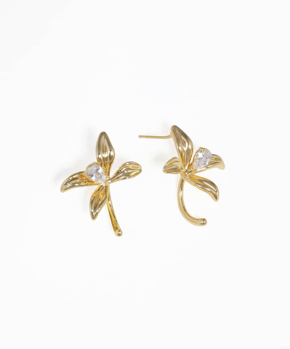 Curved floral petal earrings with crystal sparkle and gold-tone finish