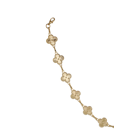Waist chain with a series of connected decorative flowers