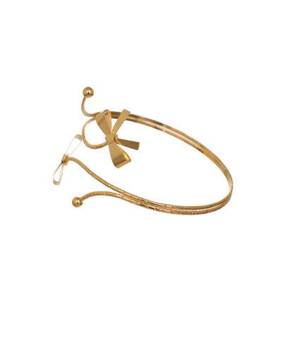 Statement Textured Spiral Arm Cuff with Bows | Stylika