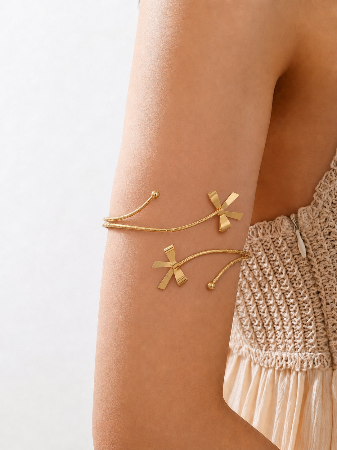 Statement Textured Spiral Arm Cuff with Bows | Stylika