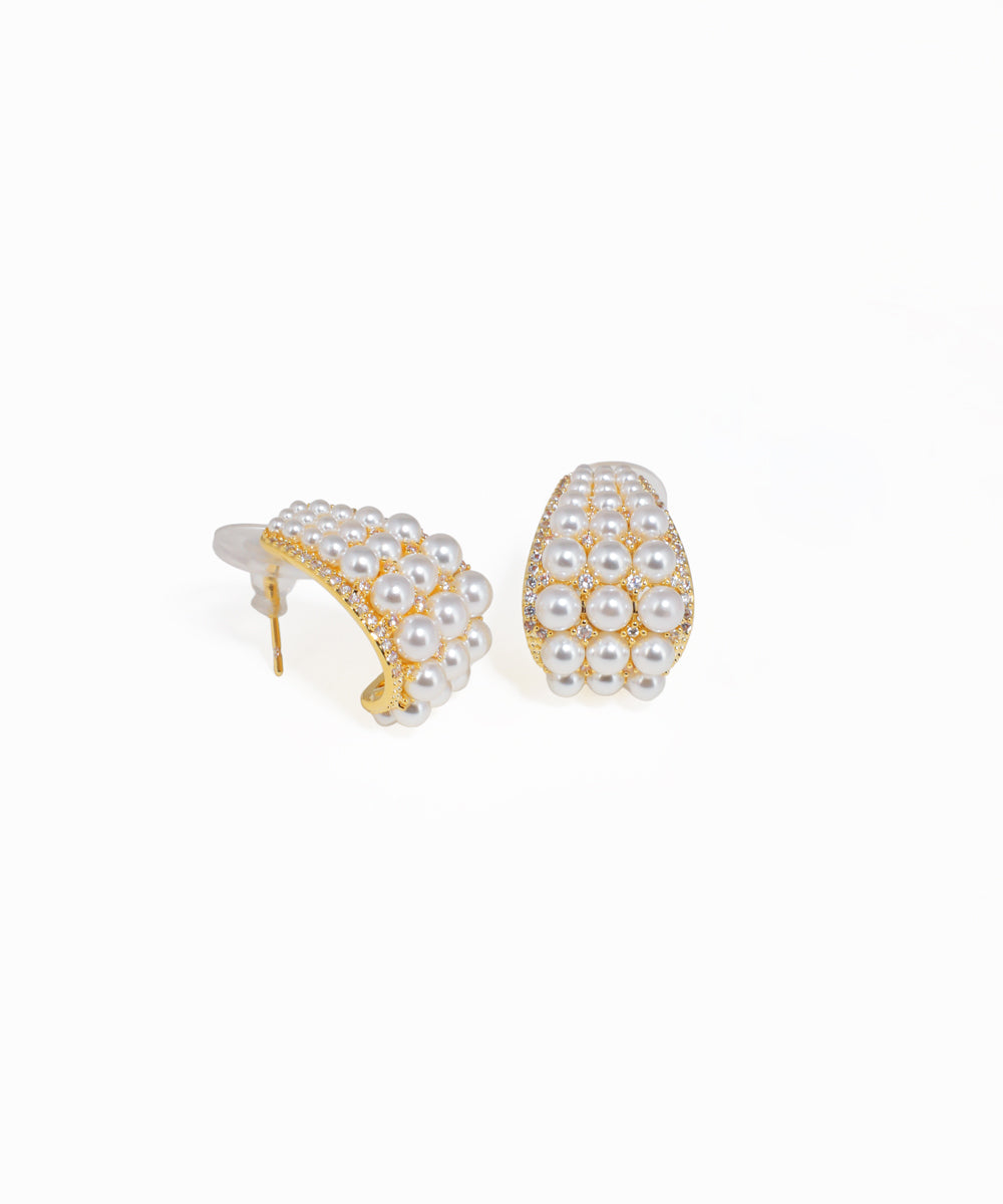 Gold dome earrings featuring sparkling crystal embellishments