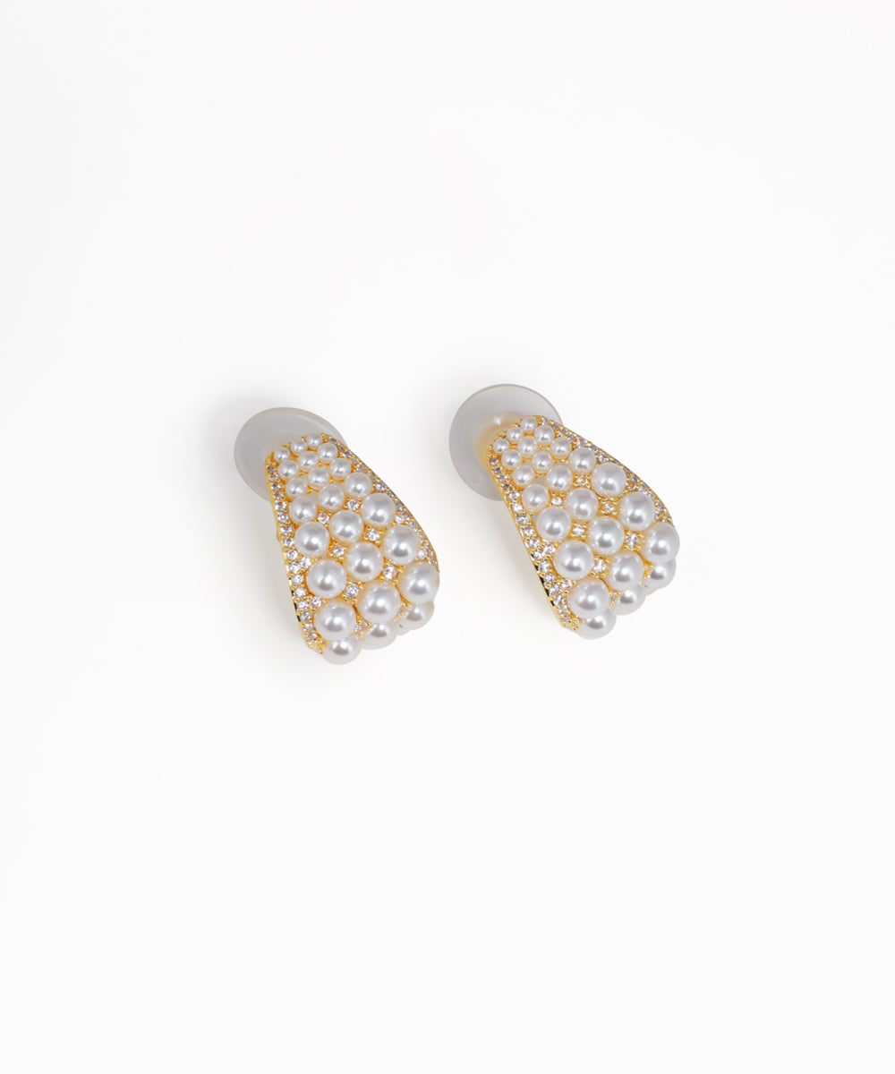 Embellished curved dome earrings with crystal accents and gold-tone finish