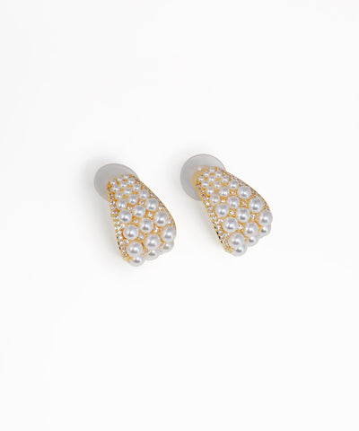Embellished curved dome earrings with crystal accents and gold-tone finish