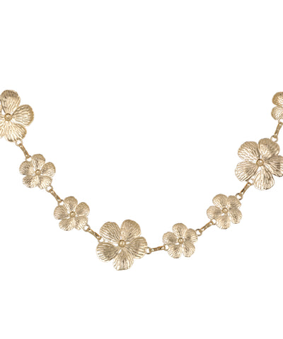 Waist chain with a long link and floral arrangement