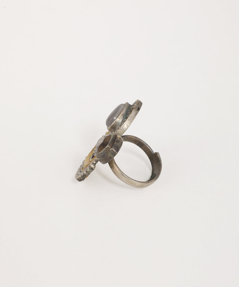 Statement oxidised ring with crescent design and intricate floral patterns