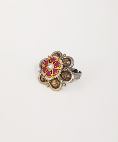 Oxidised floral statement ring featuring dual-tone metalwork and ornate design