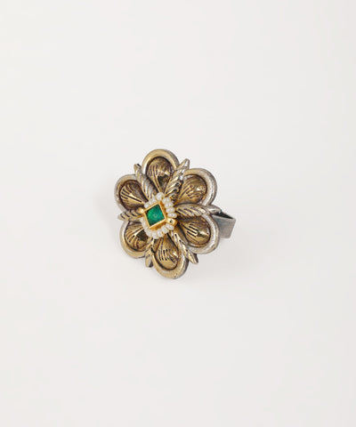 Oxidised floral statement ring featuring gemstone accents and handcrafted metalwork