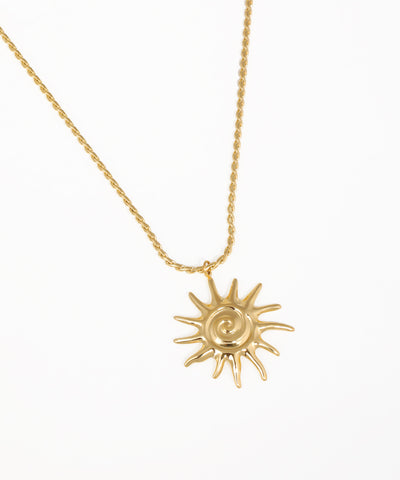 Modern sunburst pendant necklace with rope chain and gold finish