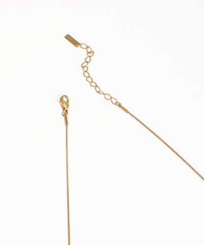 Gold organic bead necklace with modern minimalist design